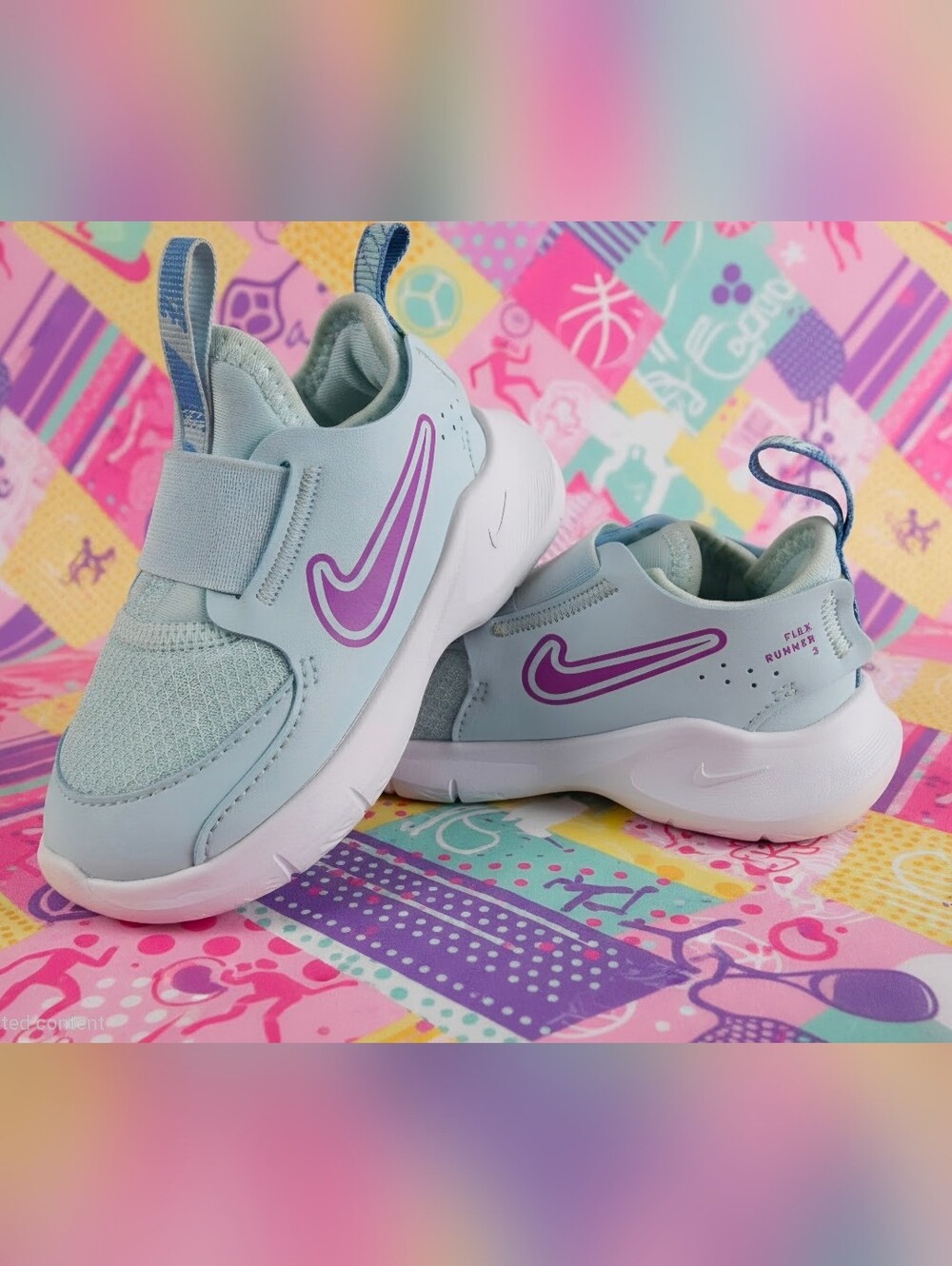 Nike Kids Light Blue Slip-On Sneakers with Purple Swoosh